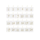 Antik fehér színű paraffinból készült, aranyszínű számokkal díszített, kocka formájú, 24 db-os adventi gyertya szett.