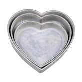 Szív formájú, háromdarabos karácsonyi bádog tálca szett.
