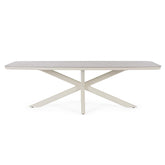 Kortárs, bézs színű, alumíniumvázzal rendelkező kültéri étkezőasztal szinterezett kő fedlappal.