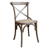 Vidéki stílusú, kaucsukfa étkezőszék, X-alakú háttámlával valamint rattan ülőfelülettel.