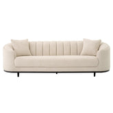 Bézs színű szövettel kárpitozott, 3 személyes dizájn kanapé .