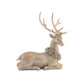 Aranyszínű, karácsonyi szarvas figura.