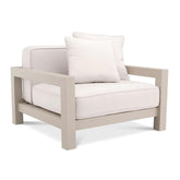 Bézs színű ülő és hátpárnákkal kialakított, formatervezett kerti design fotel.