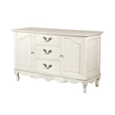 Törtfehér színű, gazdagon díszített, 3 fiókos, 2 ajtós kézműves tálalókomód.