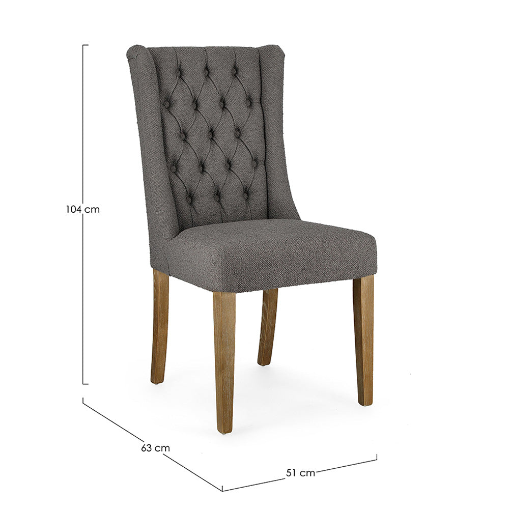 Szürke színű szövettel kárpitozott tölgyfa étkezőszék. Szürke színű szövettel kárpitozott tölgyfa étkezőszék.