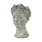 Női mellszobor formájú,antikolt felületű, szürke színű, kaspó büszt.