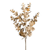 Aranyszínű, mű eukaliptusz ág.