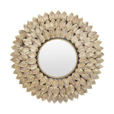 Modern stílusú, aranyszínű fém falitükör.