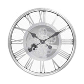 Fémből készült ezüstszínű falióra..