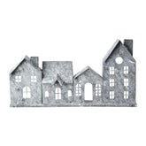 Szürke színű, bádogból készült házikókat formázó lámpás.