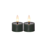 Két darab zöld LED teamécses a Star Trading Flow kollekcióból, meleg fényt adó élethű lánggal, 4 cm-es átmérővel, fehér háttéren.