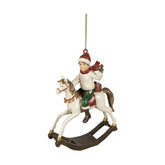 Kisfiú hintalóval akasztós karácsonyfadísz.