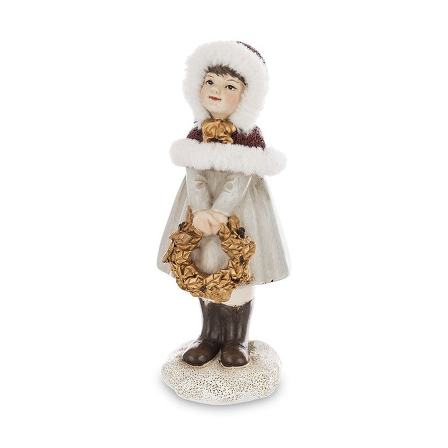 Krémszínű karácsonyi kislány figura.