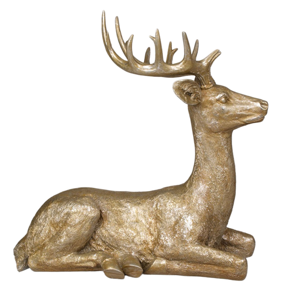 Aranyszínű karácsonyi szarvas figura.