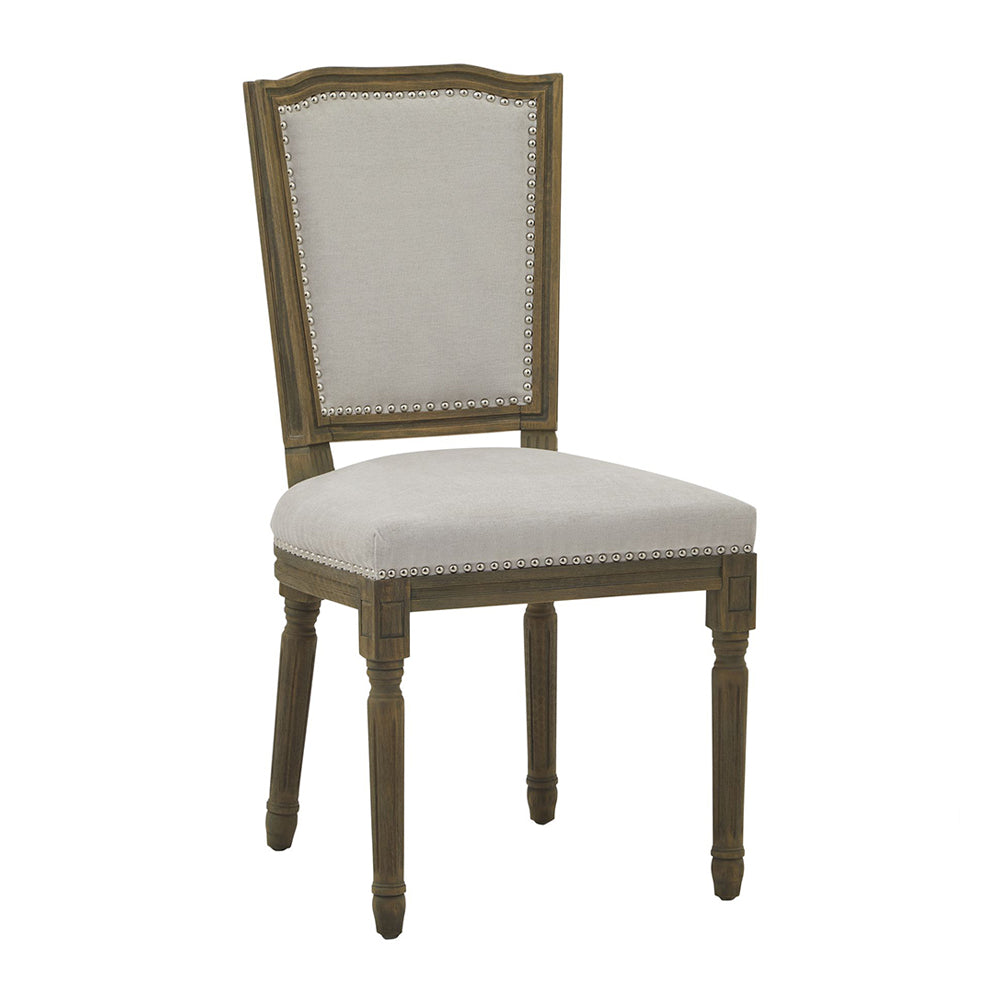 Világosszürke színű szövettel kárpitozott, koloniál stílusú kézműves étkezőszék.