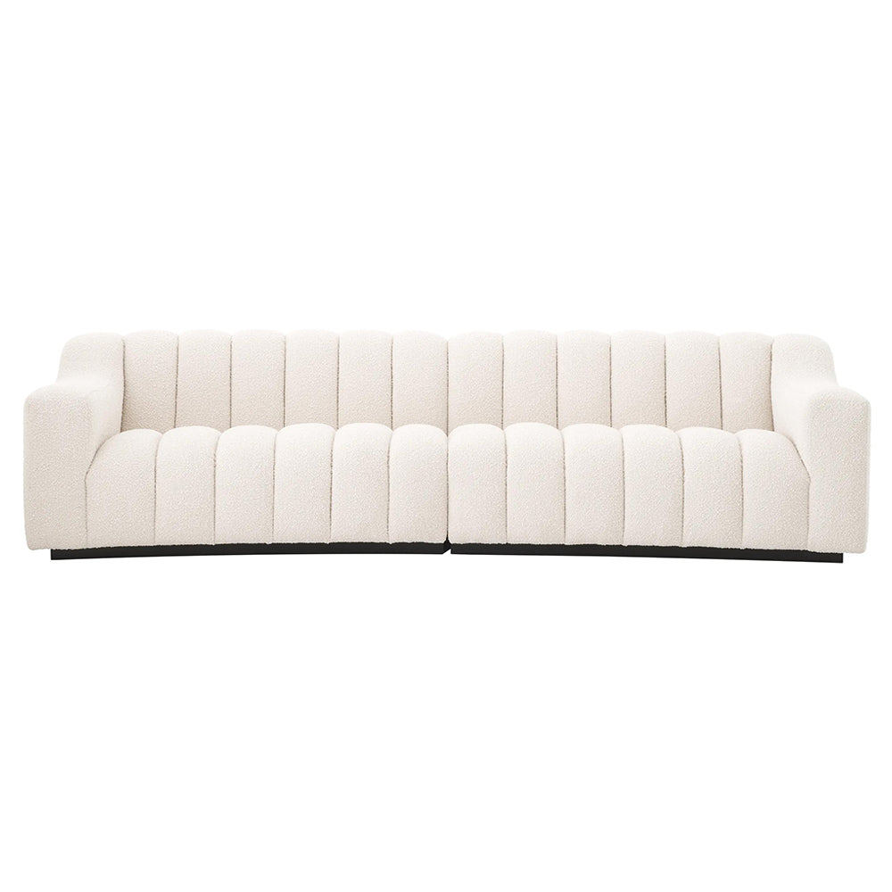 Krémszínű buklé szövettel kárpitozott óriás dizájn kanapé.