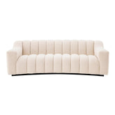 Krémszínű buklé szövettel kárpitozott dizájn kanapé.