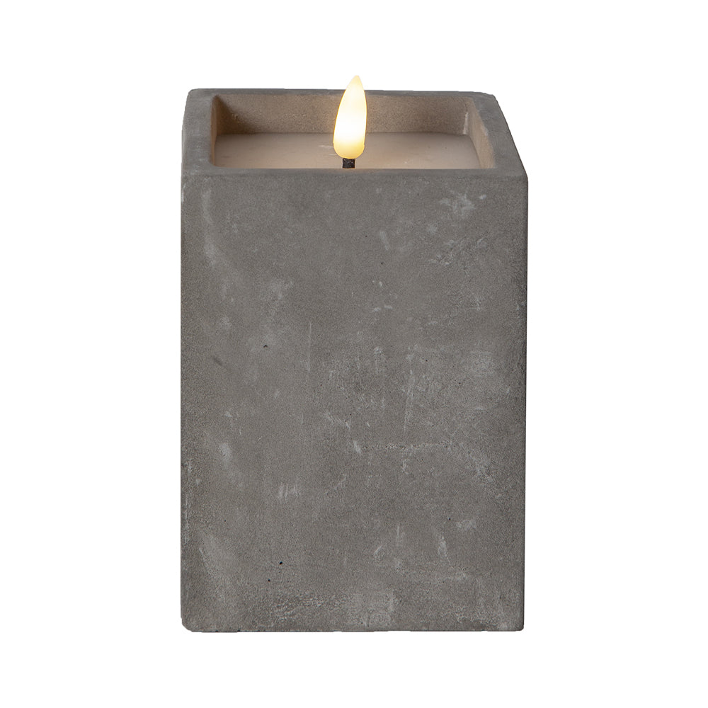 Szürke cement tégelyben kialakított LED gyertya.