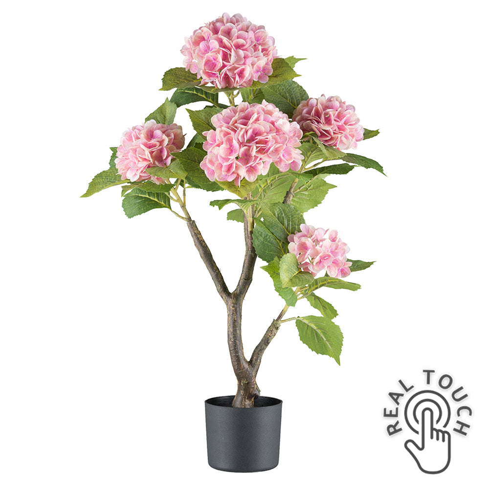 Rózsaszín színű mű hortenzia bokor.