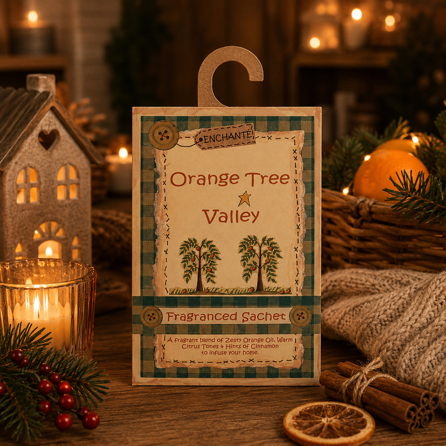 Orange Tree Valley ünnepi illattasak meghitt téli enteriőrben narancs és gyertyafény dekorációval