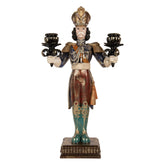 Nutcracker 55 cm-es karácsonyi diótörő figura elölnézetből, két fekete-arany gyertyatartóval, díszes fejfedővel és zöld csizmával.