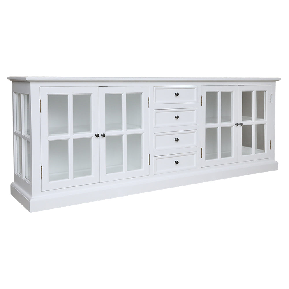 Fehér színű, 4 ajtós és 4 fiókos vitrines komódszekrény.