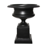 Fémből készült,, fekete színű óriás kaspó-váza.