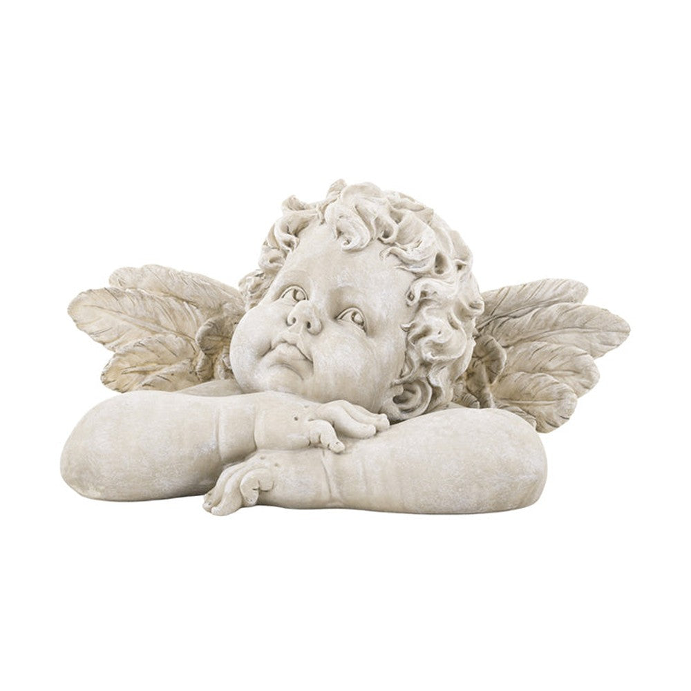 Kőhatású puttó figura.