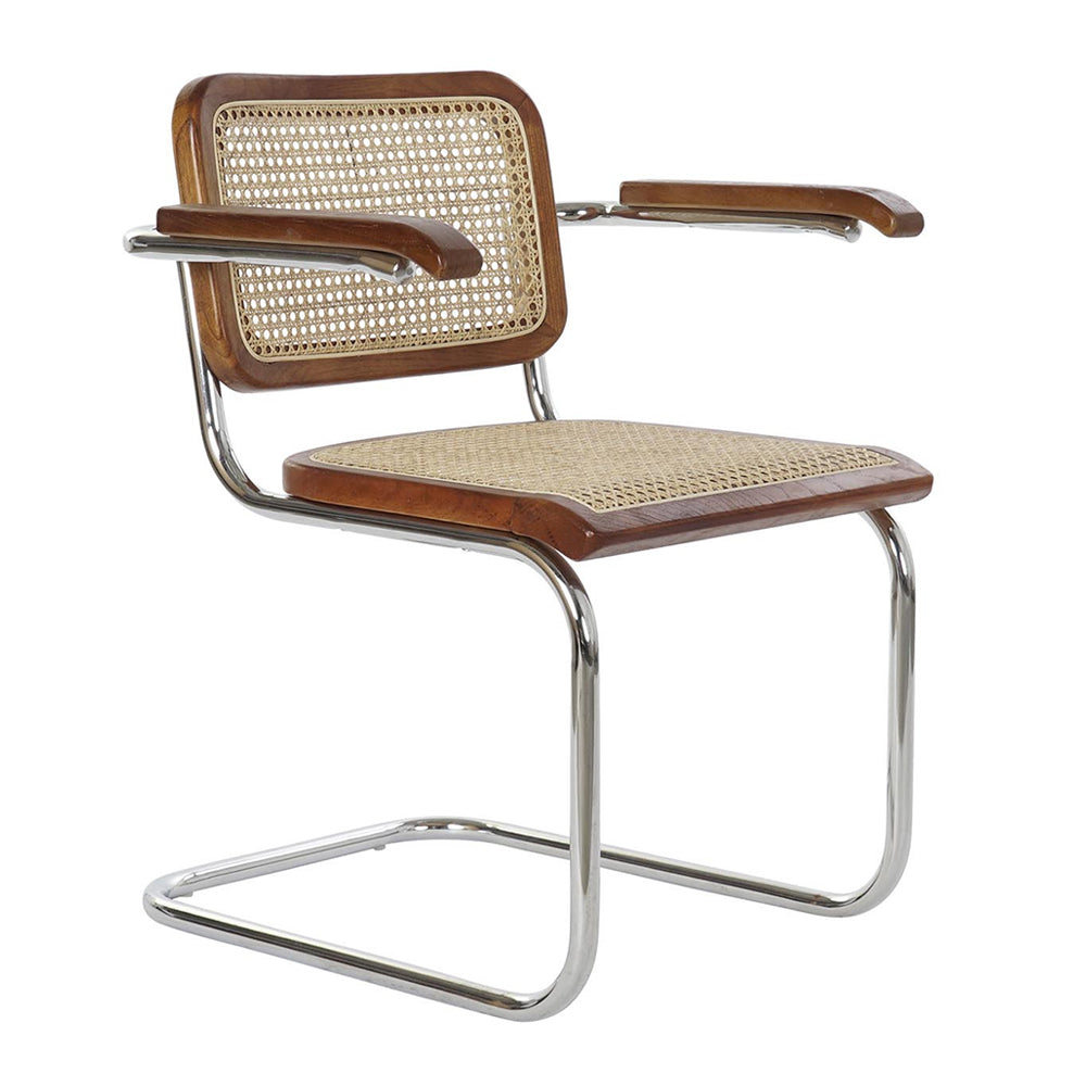 Modern fémvázas, barna színű, rattan betétes karosszék.