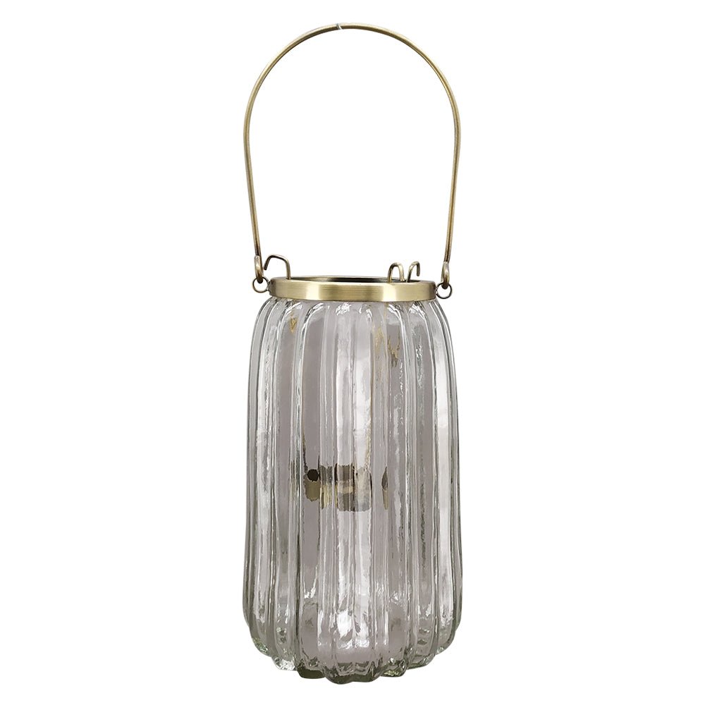 Bordázott üvegből és aranyszínű alumíniumból készült mécsestartó.