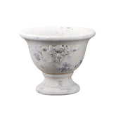 Antikolt krémszínű cement kaspó talpas kialakítással, növényi díszítéssel – VALO kollekció