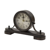 Antikolt felületű fém asztali óra.