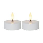 2 darabos, fehér színű műanyag testtel rendelkező, időzítővel ellátott 5,8 cm átmérőjű LED teamécses meleg fehér fényű, realisztikus LED lánggal.