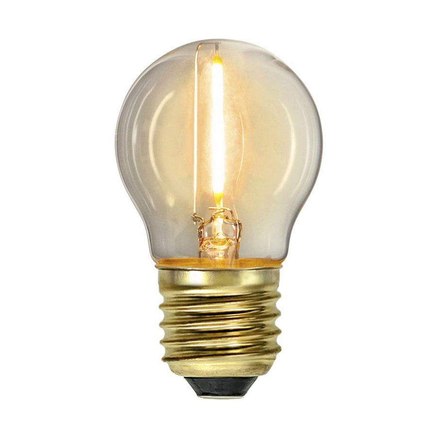 Clear Filament dekorációs izzó. Meleg fehér fényű LED dekorációs izzó áttetsző üveggel.