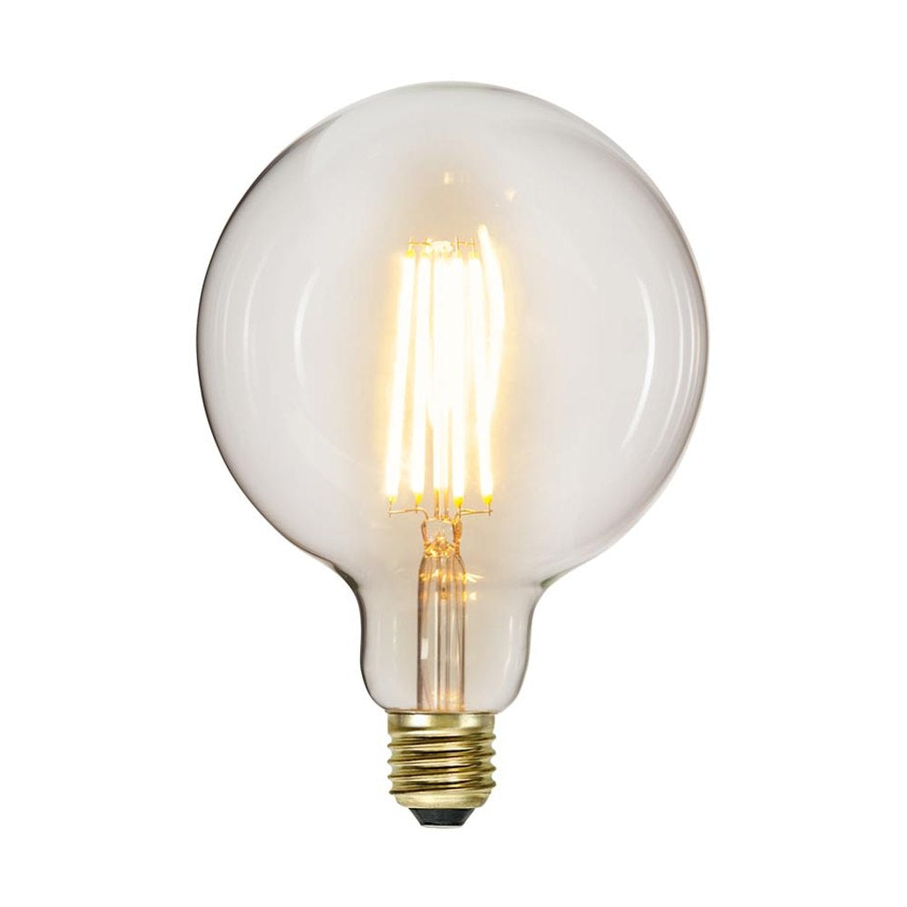 Clear Filament dekorációs izzó. Meleg fehér fényű LED dekorációs izzó áttetsző üveggel.