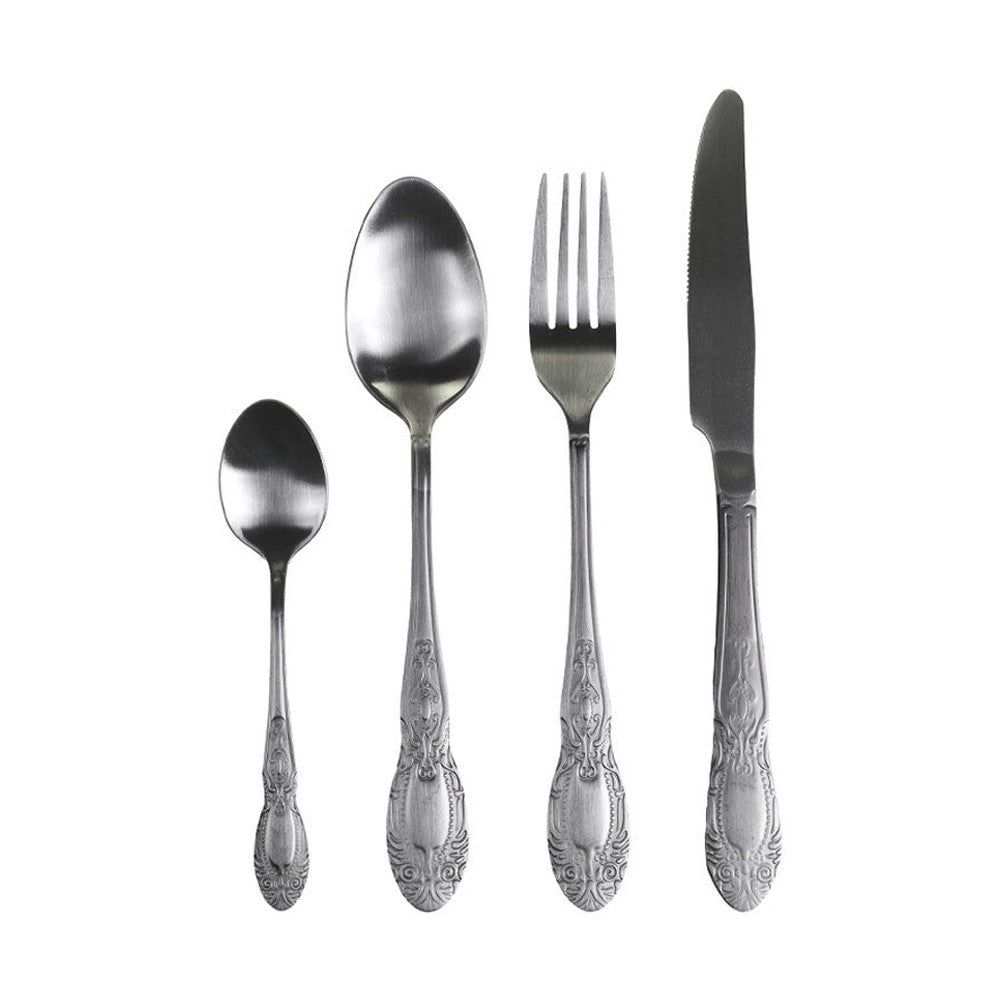 Ezüst színű, vintage stílusú, rozsdamentes acélból készült négydarabos evőeszközkészlet.