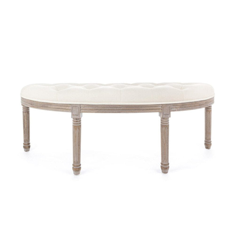 Koloniál stílusú, nyírfából és kaucsukfából készült, bézs színű, bársonyhatású textíliával kárpitozott kézműves ülőpad.