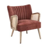 Retró stílusú, téglavörös színű bársonyhatású szövettel kárpitozott kaucsukfa klubfotel.