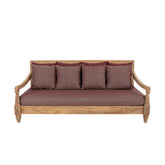 Keleti stílusú teakfa kanapé bordó színű ülő- és hátpárnákkal.