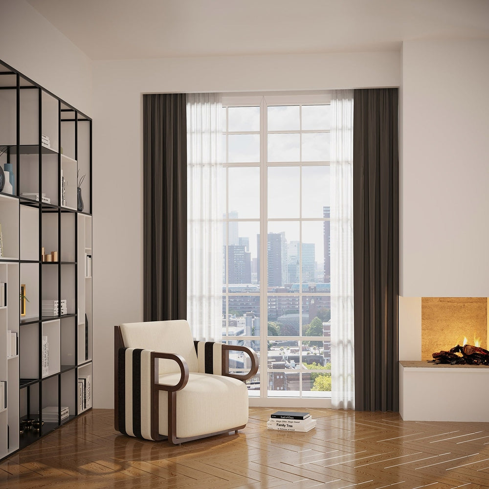 Modern nappaliban, ablak előtt, kandalló mellett álló kortars, design fotel. Modern nappaliban, ablak előtt, kandalló mellett álló kortars, design fotel.