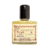 Cinnamon Creek illóolaj 10 ml-es üvegcse fekete kupakkal, Enchante márka