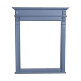 Country stílusú fenyőfakeretes tükör, klasszicizáló faragásokkal. Világoskék színű.