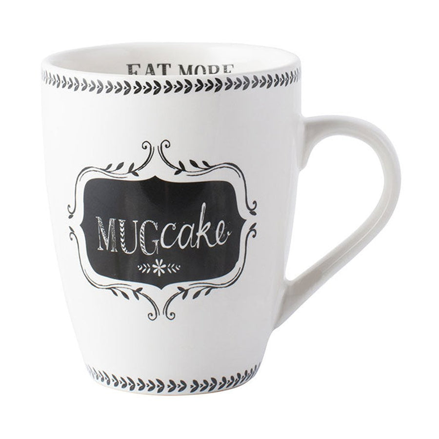 White ceramic Mugcake mug from the Stir it Up collection with a decorative black label reading Mugcake.