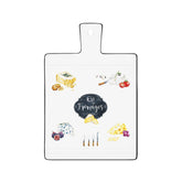 Fekete szegéjű, fehér színű porcelán vágólap zöldségmotívumokkal és kitchen felirattal