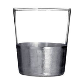 Modern, ezüstszínű fémmel díszített, röviditalos üveg pohár.