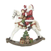 Vintage stílusú, karácsonyi hintaló Télapóval és kisfiúval