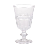 Vintage stílusú, pontozott dombormintával díszített átlátszó üvegű borospohár.