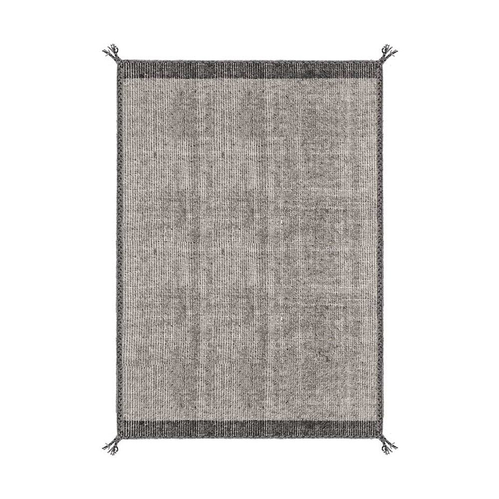 Szürke gyapjú szőnyeg.