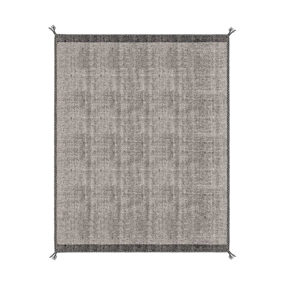 Szürke gyapjú szőnyeg.