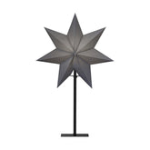 Modern, skandináv stílusú, 55 cm magas, szürkeszínű papírból készült, csillag formájú karácsonyi dekorációs lámpa fém talapzaton.